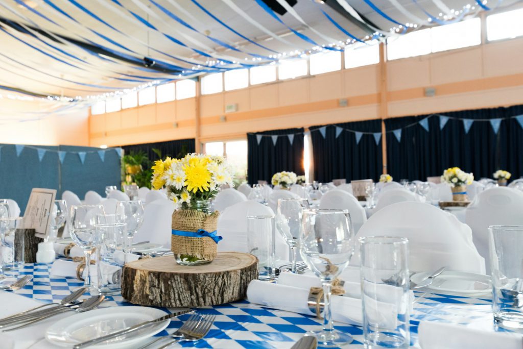 Festoon lighting strung across a marquee ceiling